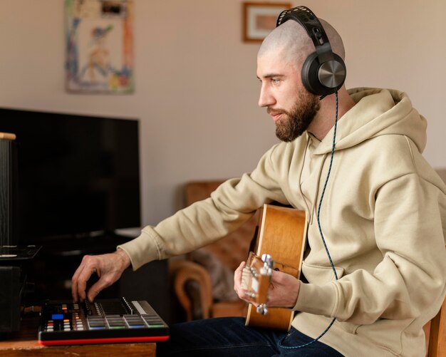 Person making music indoors