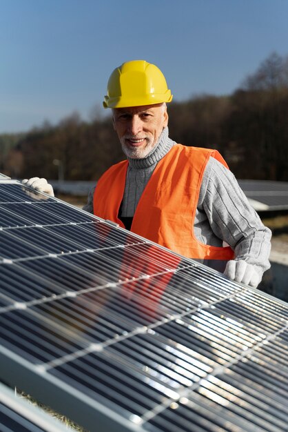 Person near alternative energy plant