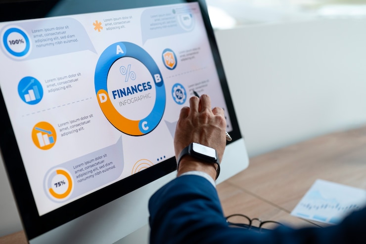 Free Photo person in the office analyzing and checking finance graphs