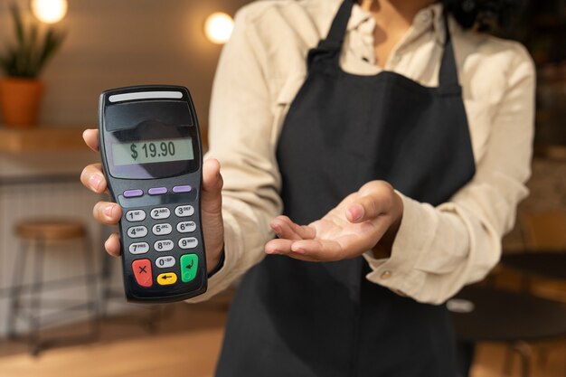 Free photo person paying using nfc technology