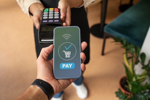 person paying using nfc technology