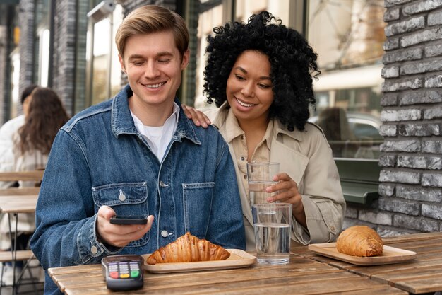 Person paying using nfc technology