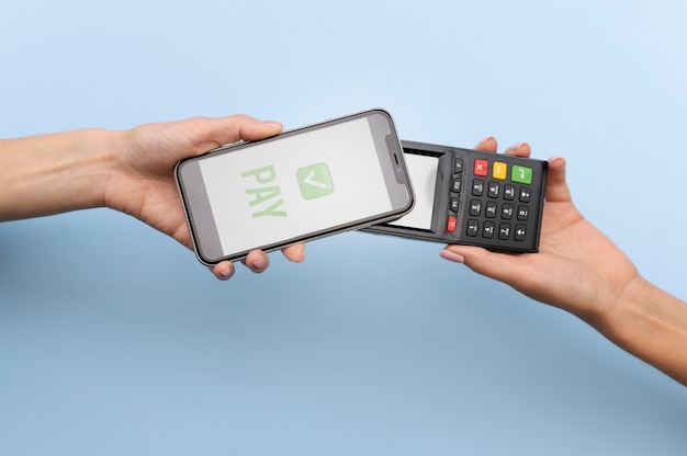 Person paying with its smartphone wallet app