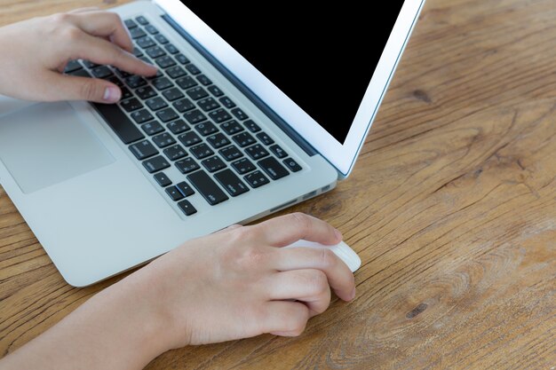 Person playing a computer and a mouse