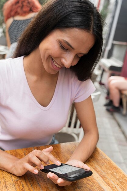 Person playing a sudoku game on a smartphone