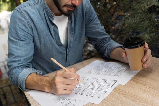 Person playing a sudoku game