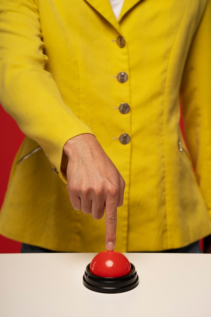 Free Photo person pressing a buzzer
