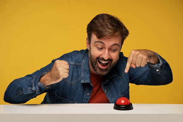 Person pressing a buzzer