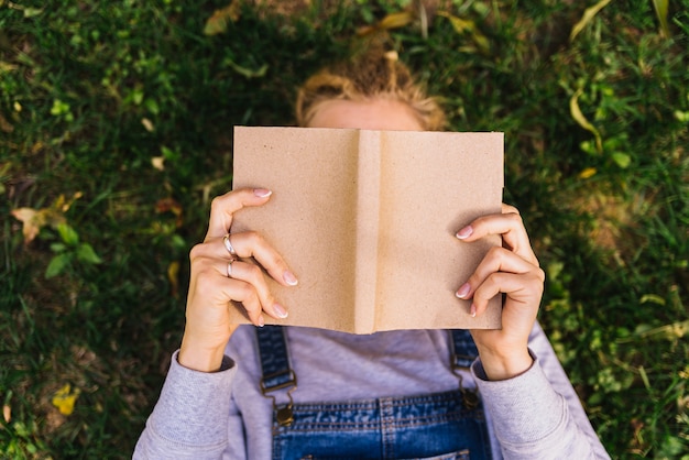 Person reading on the grass