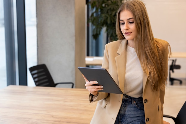 Person reading an online magazine using a digital device