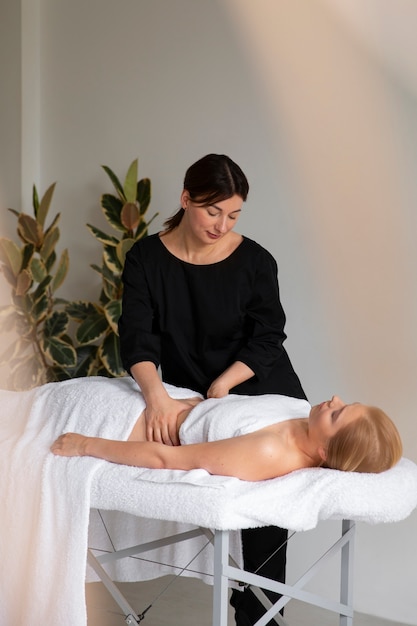 person-receiving-professional-massage_52