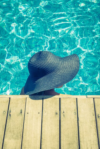 person relaxation poolside adult travel