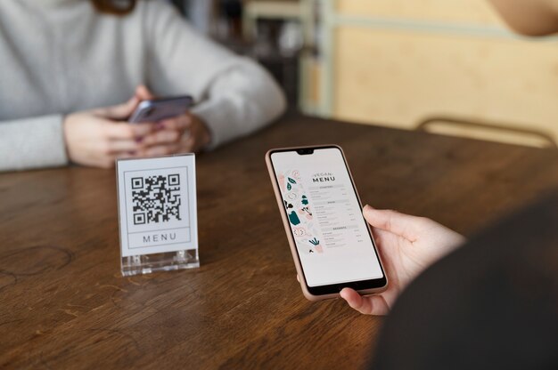 Person scanning qr code at the cafeteria