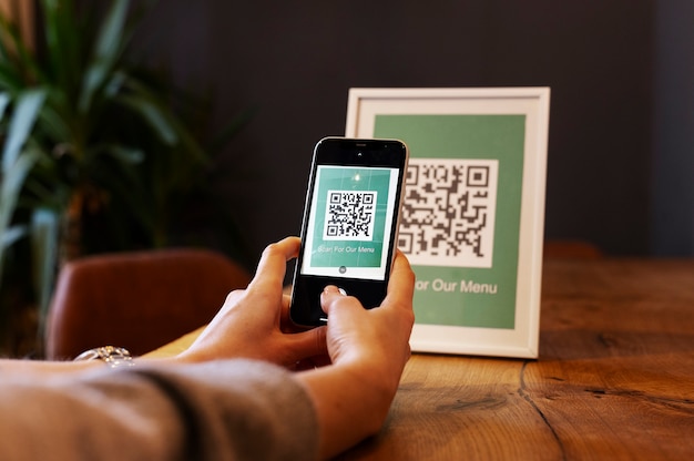 Person scanning qr code