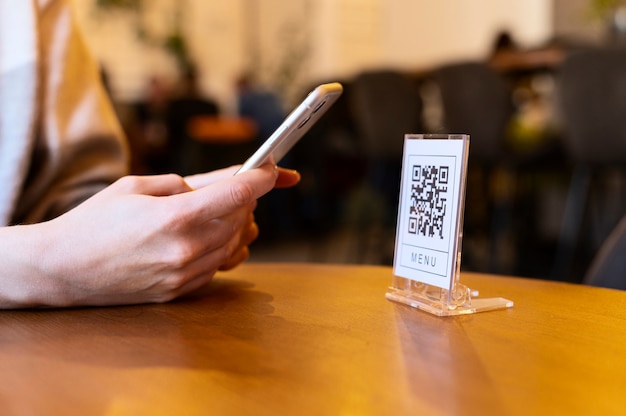 Person scanning qr code