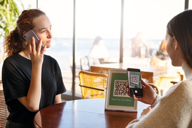 Person Scanning Qr Code