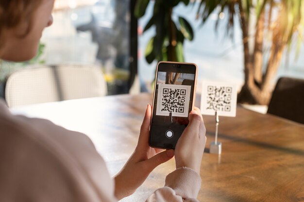 Person scanning qr code