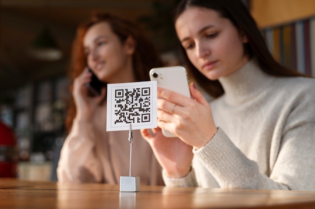 Person scanning qr code