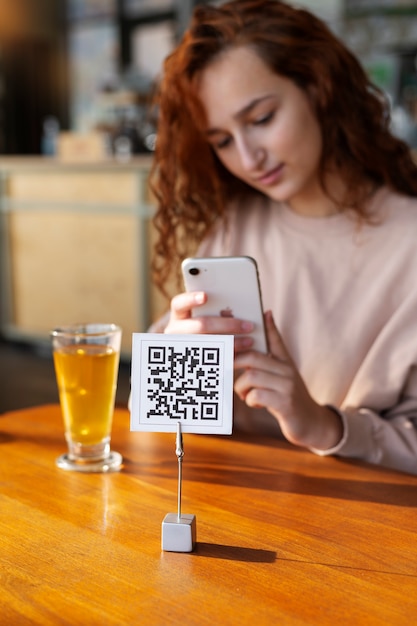 Person scanning qr code