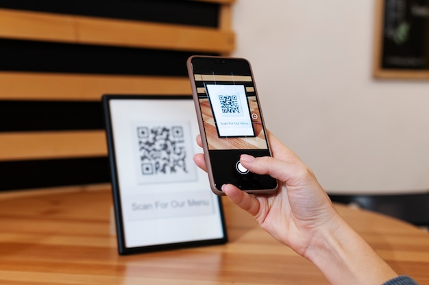 Person scanning qr code