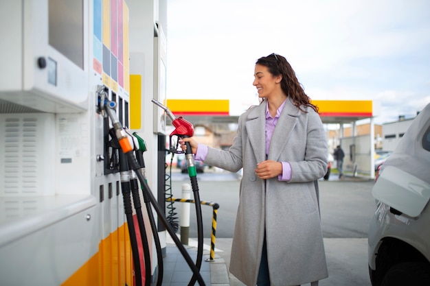 Free photo person spending time at the gas station