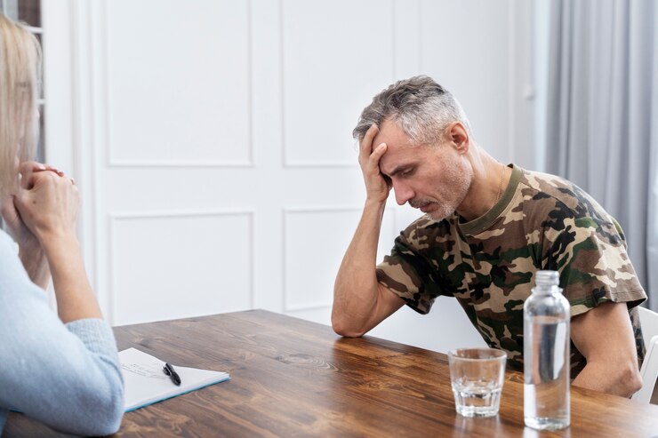 Free Photo person suffering from ptsd at psychologist