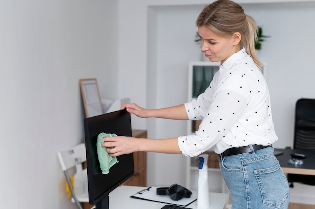 person taking care of office cleaning