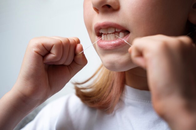 Person taking care of teeth hygiene