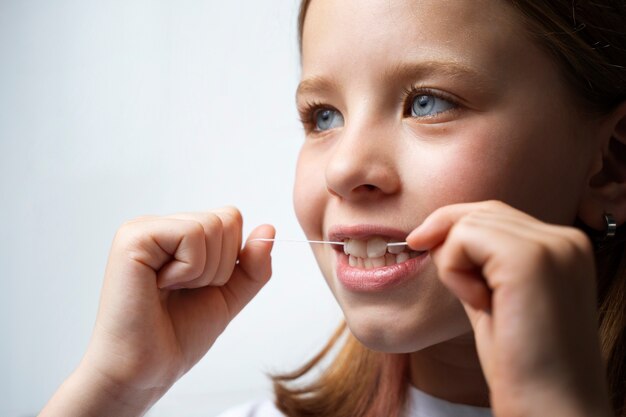 Person taking care of teeth hygiene