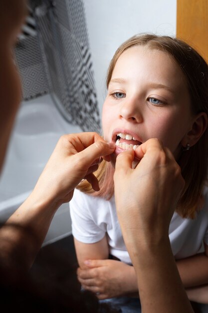 Person taking care of teeth hygiene