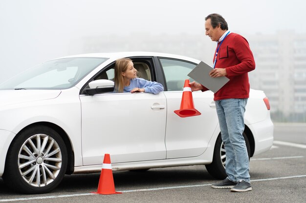 Free photo person taking driver's license exam