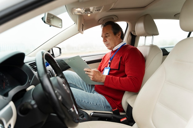 Free photo person taking driver's license exam