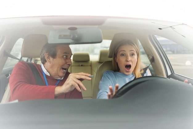 Free photo person taking driver's license exam