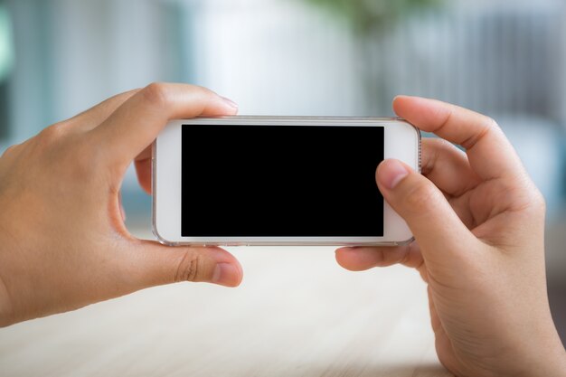 Person taking a photo with the mobile