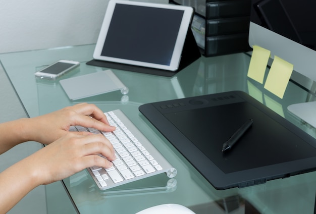 Person typing on a computer