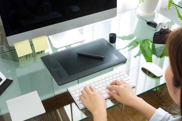 Person typing on a computer