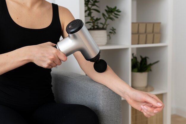 Person using massage gun