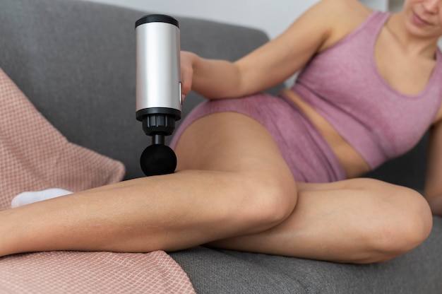 Person using massage gun