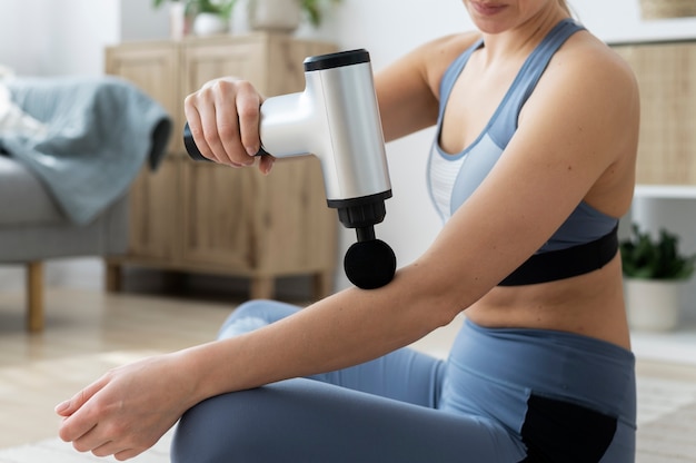 Person using massage gun