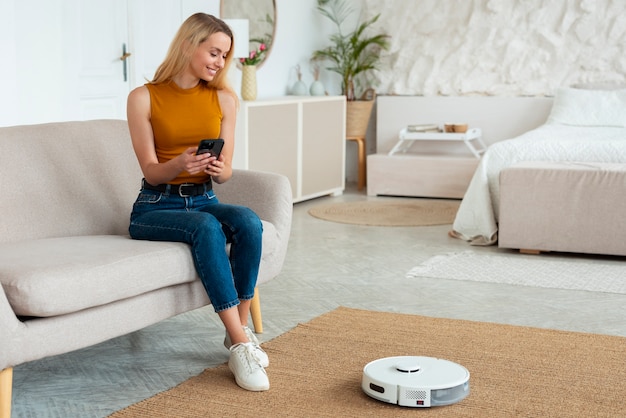 Person using vacuum cleaner at home