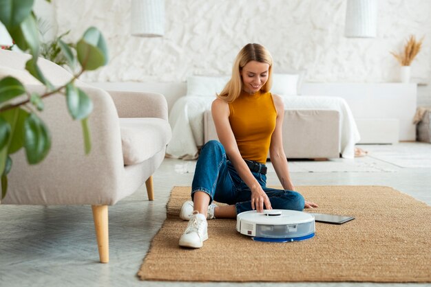 Person using vacuum cleaner at home