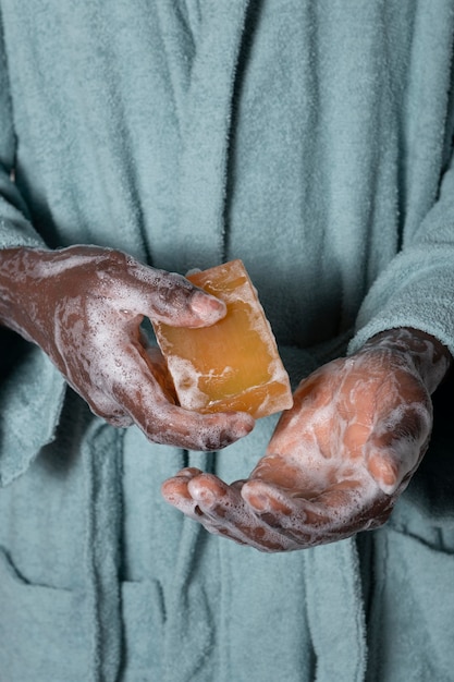 Person washing hands with soap