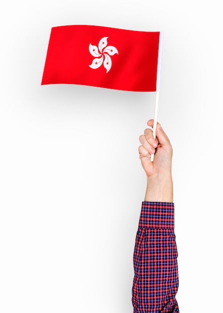 홍콩의 깃발을 흔들며 사람