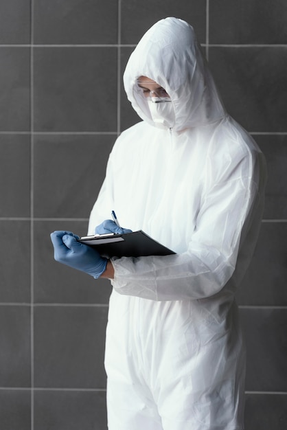 Person wearing a protective equipment against a bio-hazard