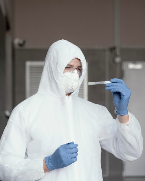 Person wearing a protective equipment against a bio-hazard