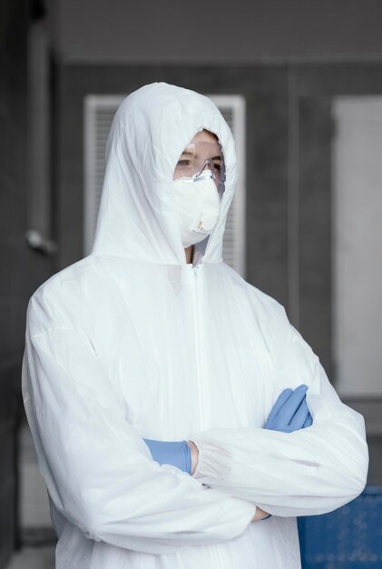 Person wearing a protective equipment against a bio-hazard