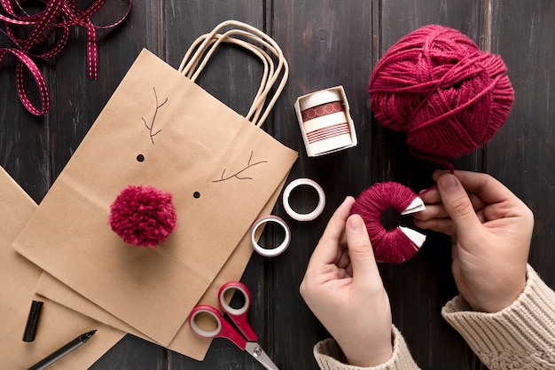 Free photo person with festive christmas bag