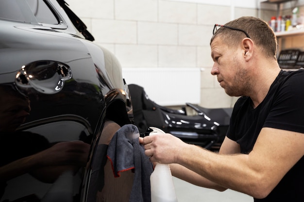 Person working on car wrapping