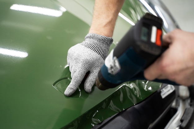 Person working on car wrapping