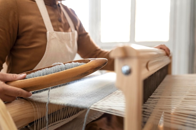 Person working in an embroidery workshop